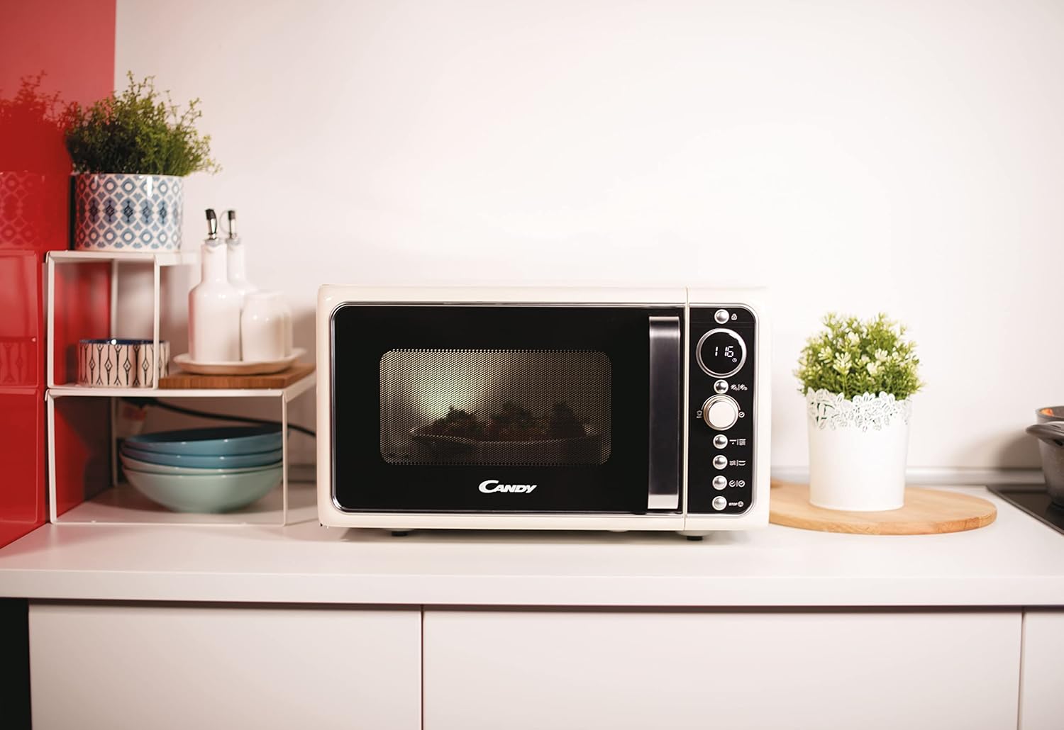 Candy Mikrowelle / 900 Watt/Grill 1000 Watt / 25 Liter/Grilleinsatz/Creme/Modell: DIVO G25CC